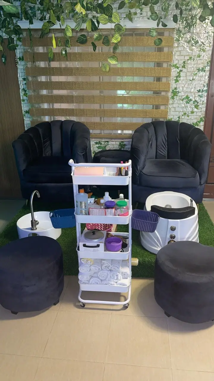 Professional pedicure area at La'kenzy Skincare & Aesthetic SPA in Mowe, Ogun state with pedicure chairs, foot spa basins, and treatment supplies.